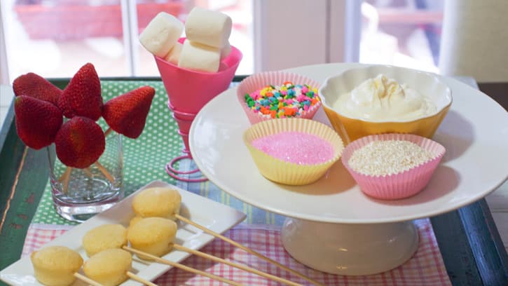 frosting fondue kit with marshmallows, strawberries, frosting and sprinkles