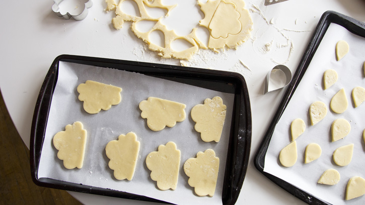 cut out shapes on cookie sheets
