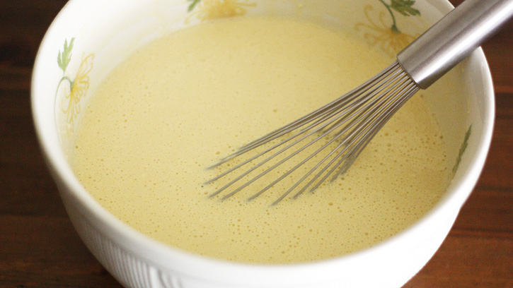 whisk in bowl with batter