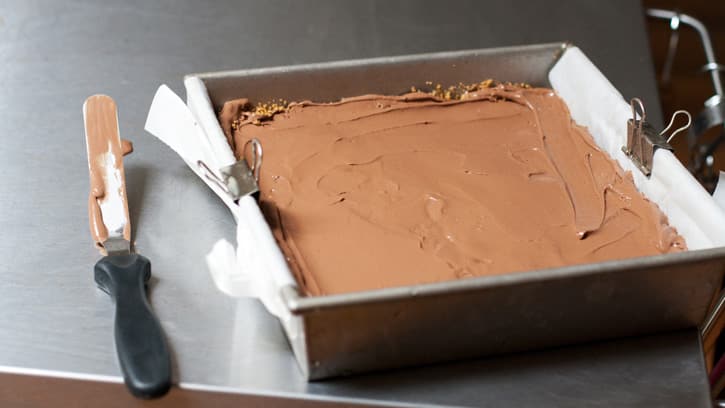 chocolate ice cream spread on top of crust