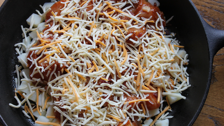 diced potatoes, seasoned chicken, bacon bits covered with shredded cheese