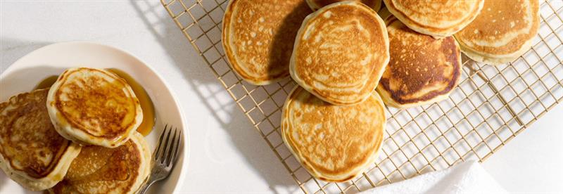 Top down image of Pancakes and Syrup.