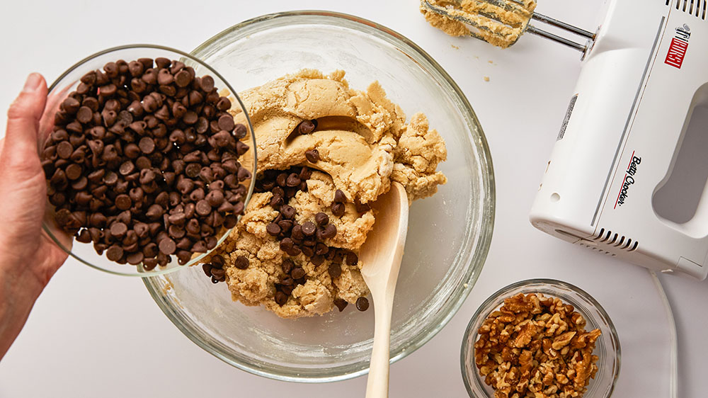 mixing in chocolate chips to ultimate chocolate chip cookie dough