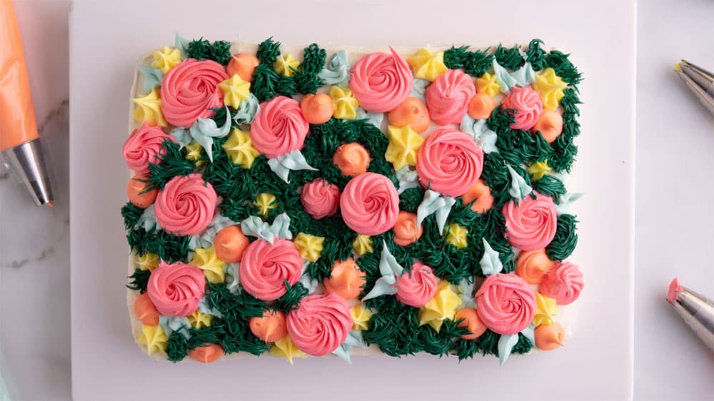frosted cake with flowers