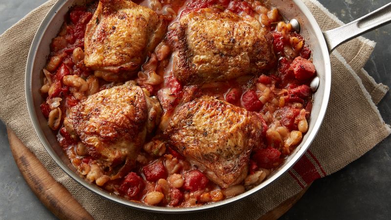 Skillet Chicken Thighs with Fire-Roasted Tomatoes and Smashed White Beans