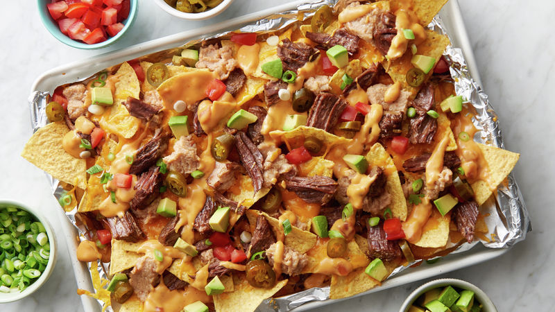 Slow Cooker Beef Barbacoa Nachos with Queso