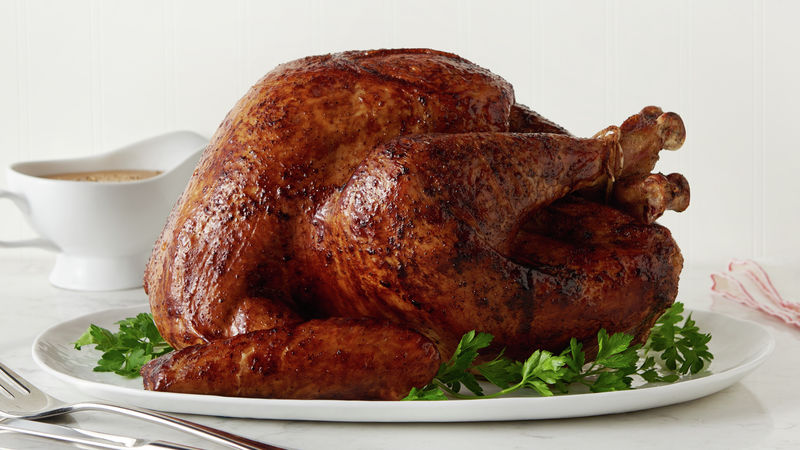 Whole roasted turkey on platter.