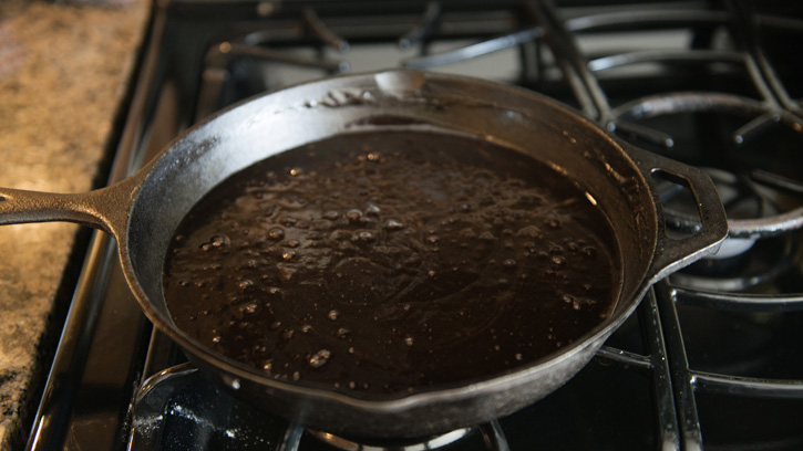 cake cooking in skillet on stovetop