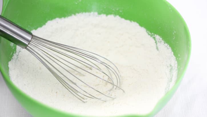 whisking flour