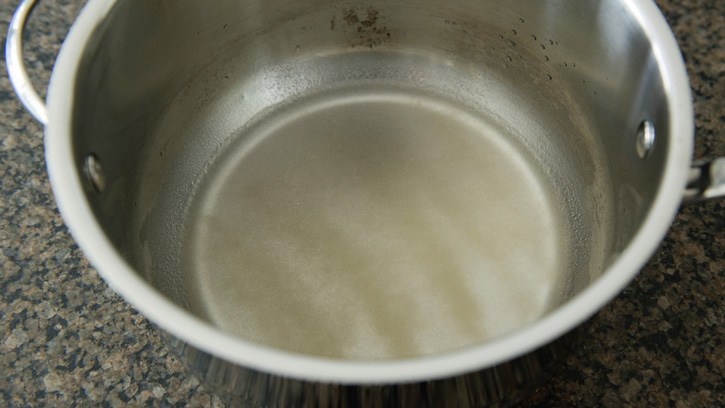 water in saucepan with gelatin