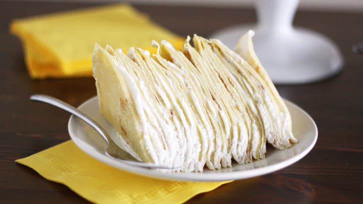 one slice of crepe cake showing all layers