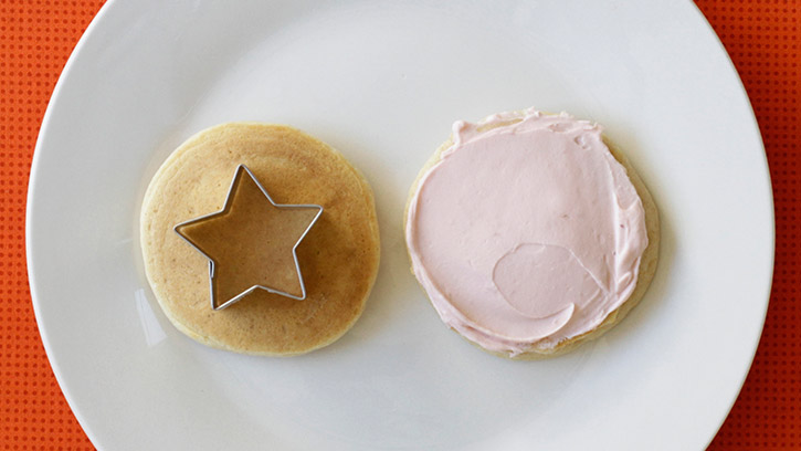 filling on one pancake and star-shaped cutter on other