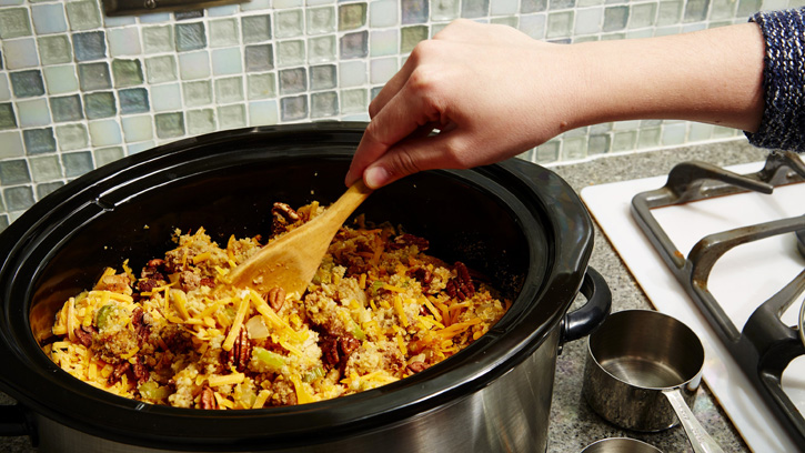 stirring stuffing in slow cooker