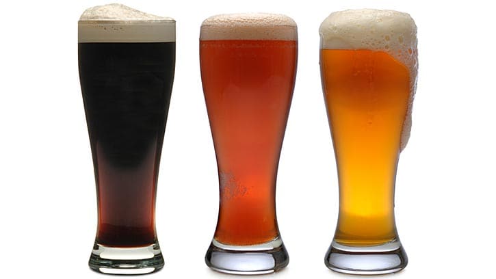 Three glasses of beer, light, medium, dark
