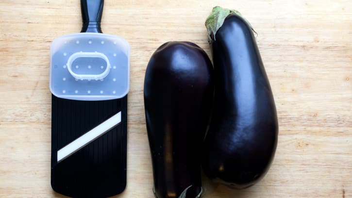 handheld mandolin and eggplants