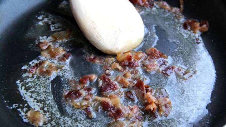 Crumbed bacon in a skillet