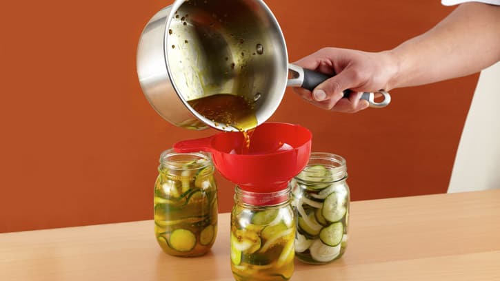 pouring mixture into jars